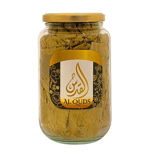 Glasburk med inlagda vinblad Al Quds, orientaliskt livsmedel, guldlock