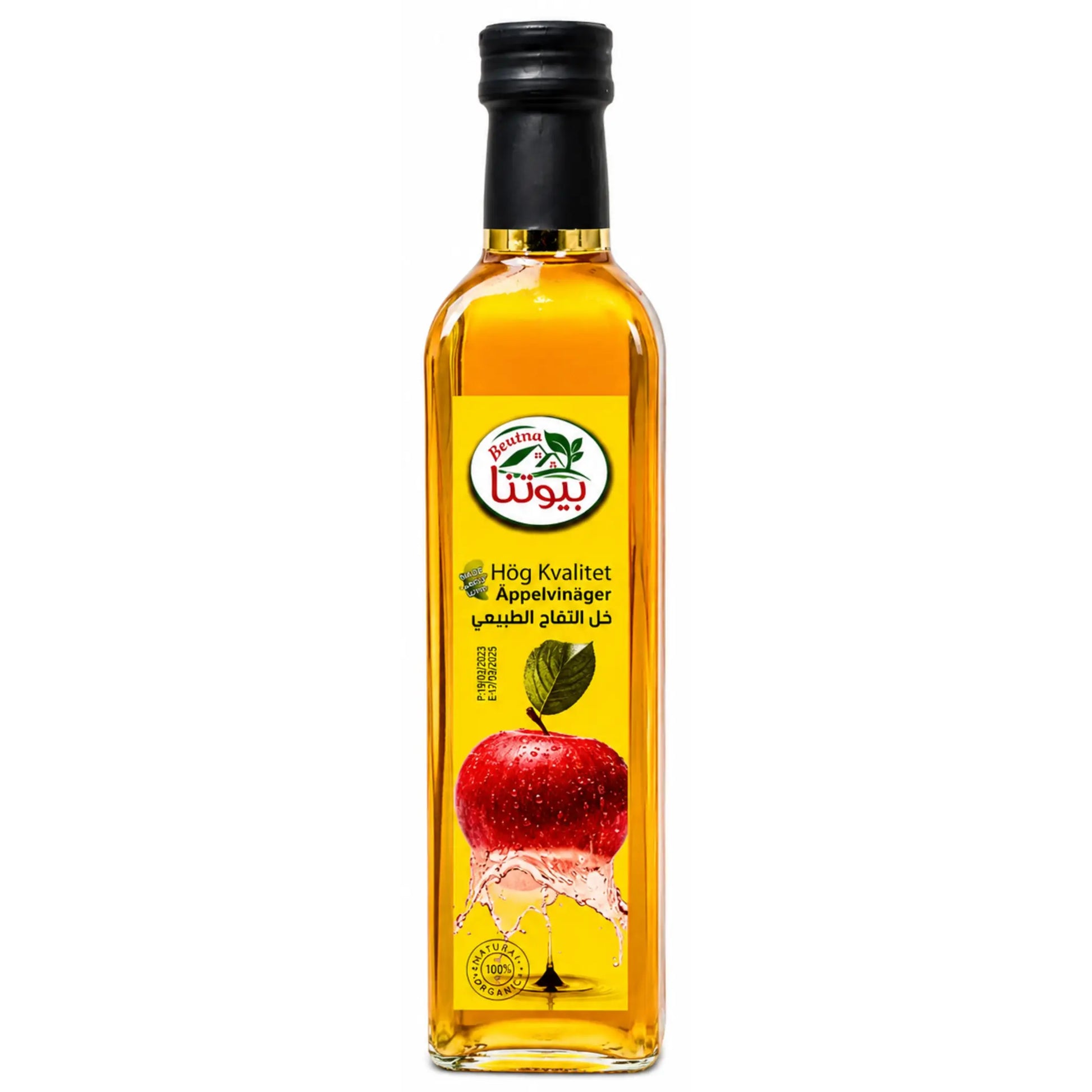 Flaska äppelvinäger med svart kork och etikett med äpple, gul vätska