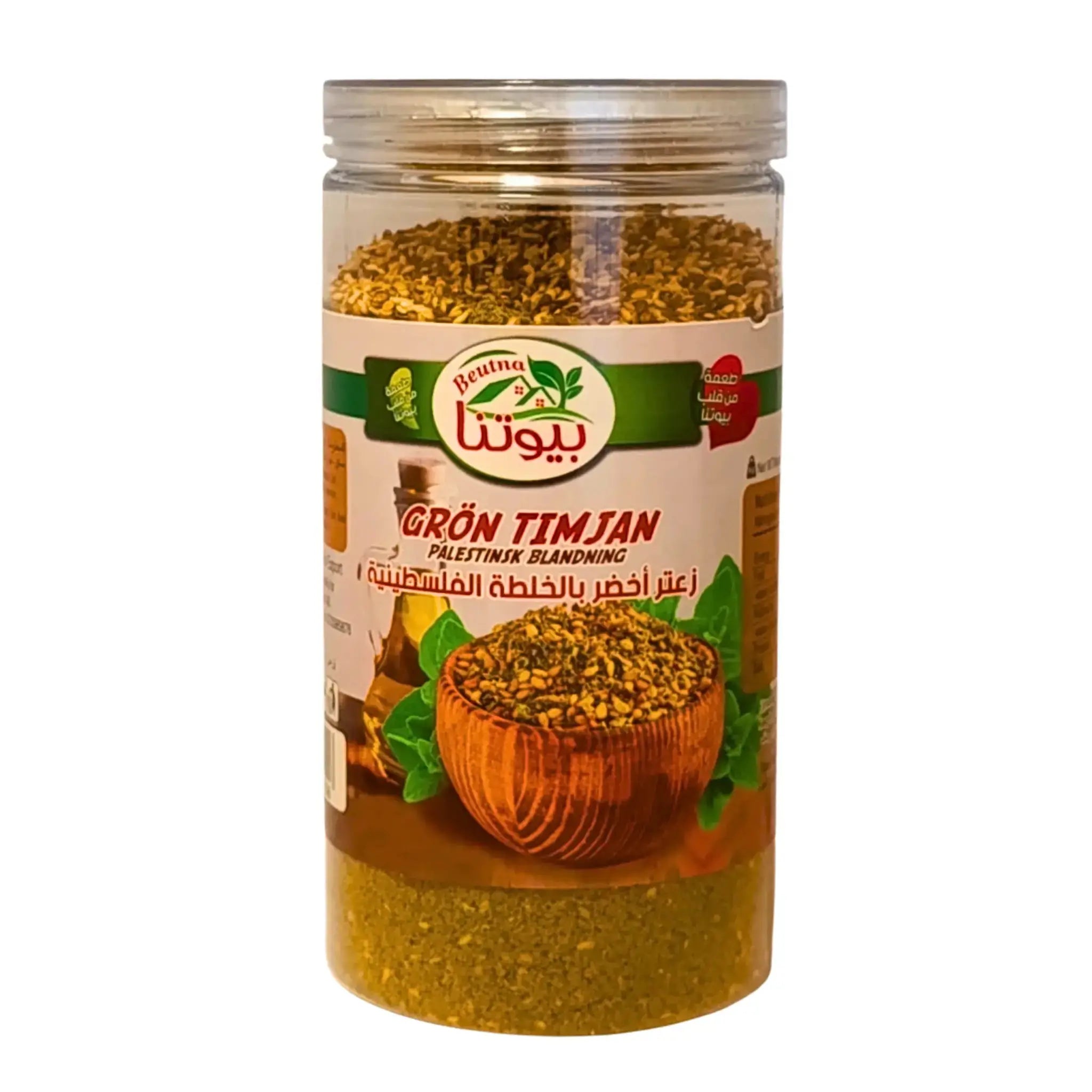 Burk med grön timjan palestinsk blandning, tydlig etikett och örtkrydda synlig.
