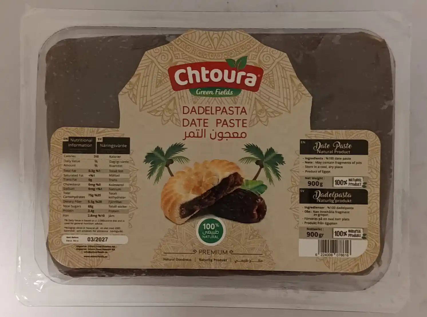 Förpackning med dadelpasta 900g, tydlig etikett och näringsinformation, orientaliskt bakverk.