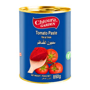 Burk med tomatpuré 850g, blå etikett, röda tomater och träsked med puré