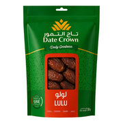 Grön påse med fönster som visar mörka dadlar, Date Crown Lulu