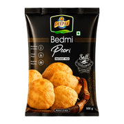 500g förpackning av Deepak Bedmi Poori Mix för tillagning av indiska friterade linsbröd.