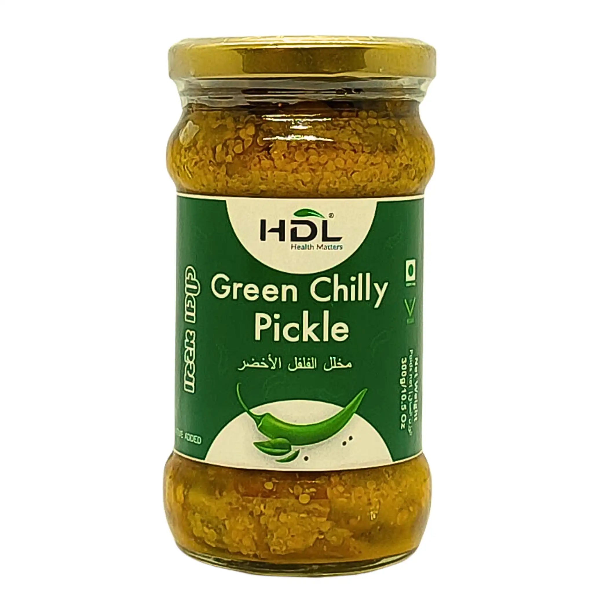 Glasburk med grön chili pickle, inlagd grön chili, orientaliskt tillbehör.