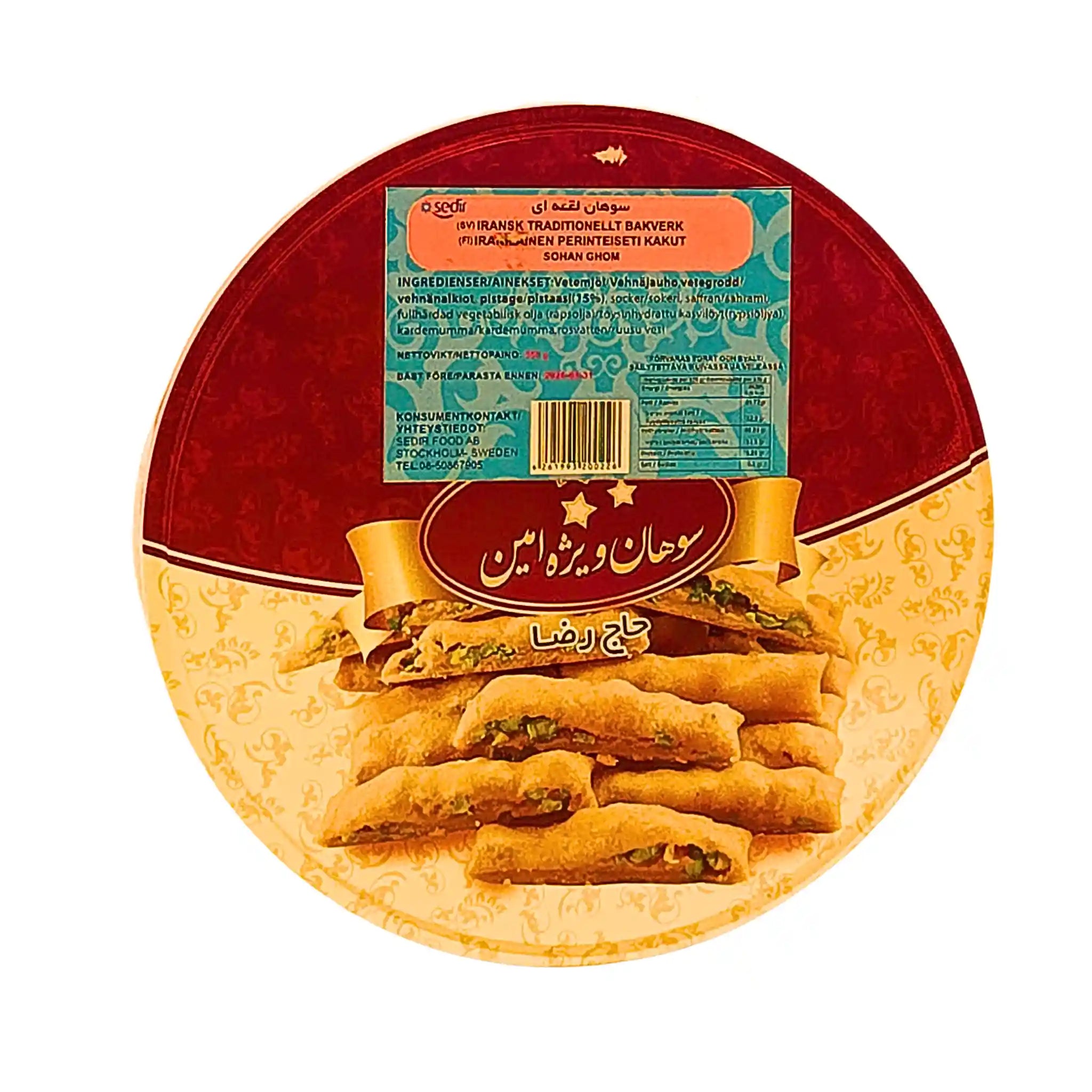 Rund förpackning med iranskt sött bakverk Sohan, dekorerad med pistagenötter.