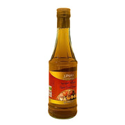 Flaska med iransk äppelcidervinäger 500ml, röd etikett med äpplen, orientaliska varor.