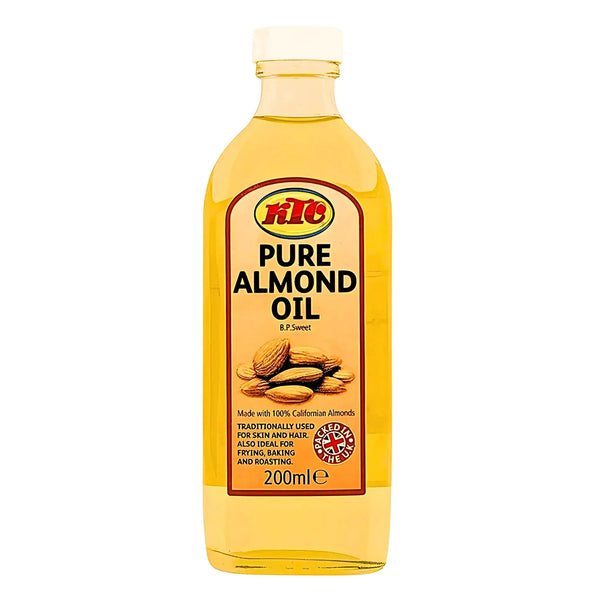 Flaska med KTC Mandelolja 200ml, klar gul olja, etikett med mandlar och text.