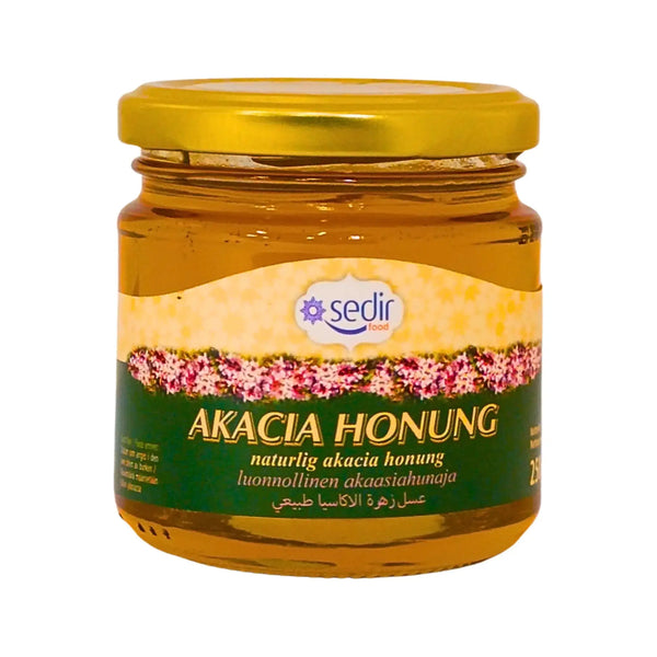 Akacia honung i glasburk med guldfärgat lock, orientaliska smaker, naturlig honung