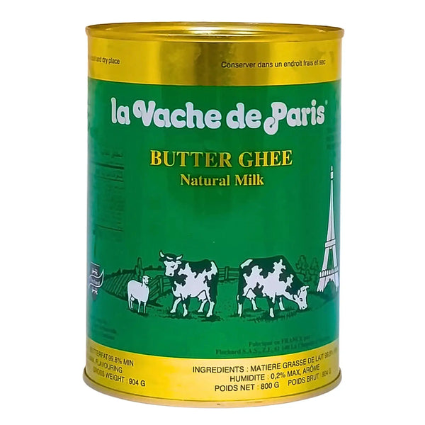 Grön burk med La Vache de Paris smör ghee, 800g, illustration av kor och Eiffeltornet.