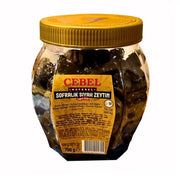 Burk med svarta oliver med kärna, Cebel, 700g, gyllene lock och tydlig etikett.