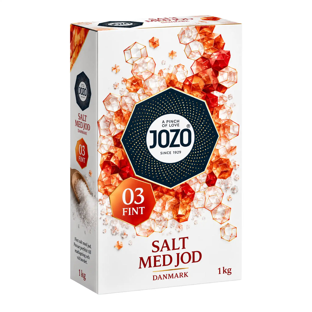 Jozo jodsalt i kartong, 1 kg, med orange saltkristaller på framsidan
