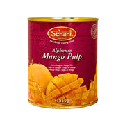 Burk Alphonso mango puré 850g med gul mango och lila etikett, exotisk frukt på konserv.